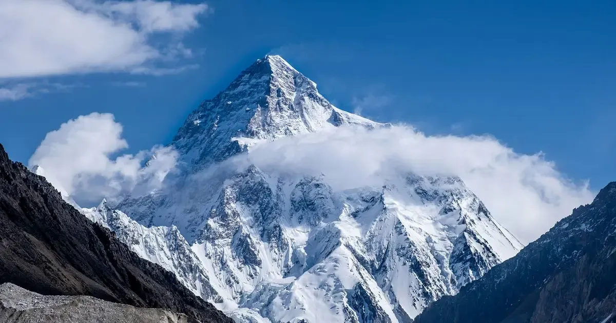 Trekker looking out at the Annapurna range, Nepal